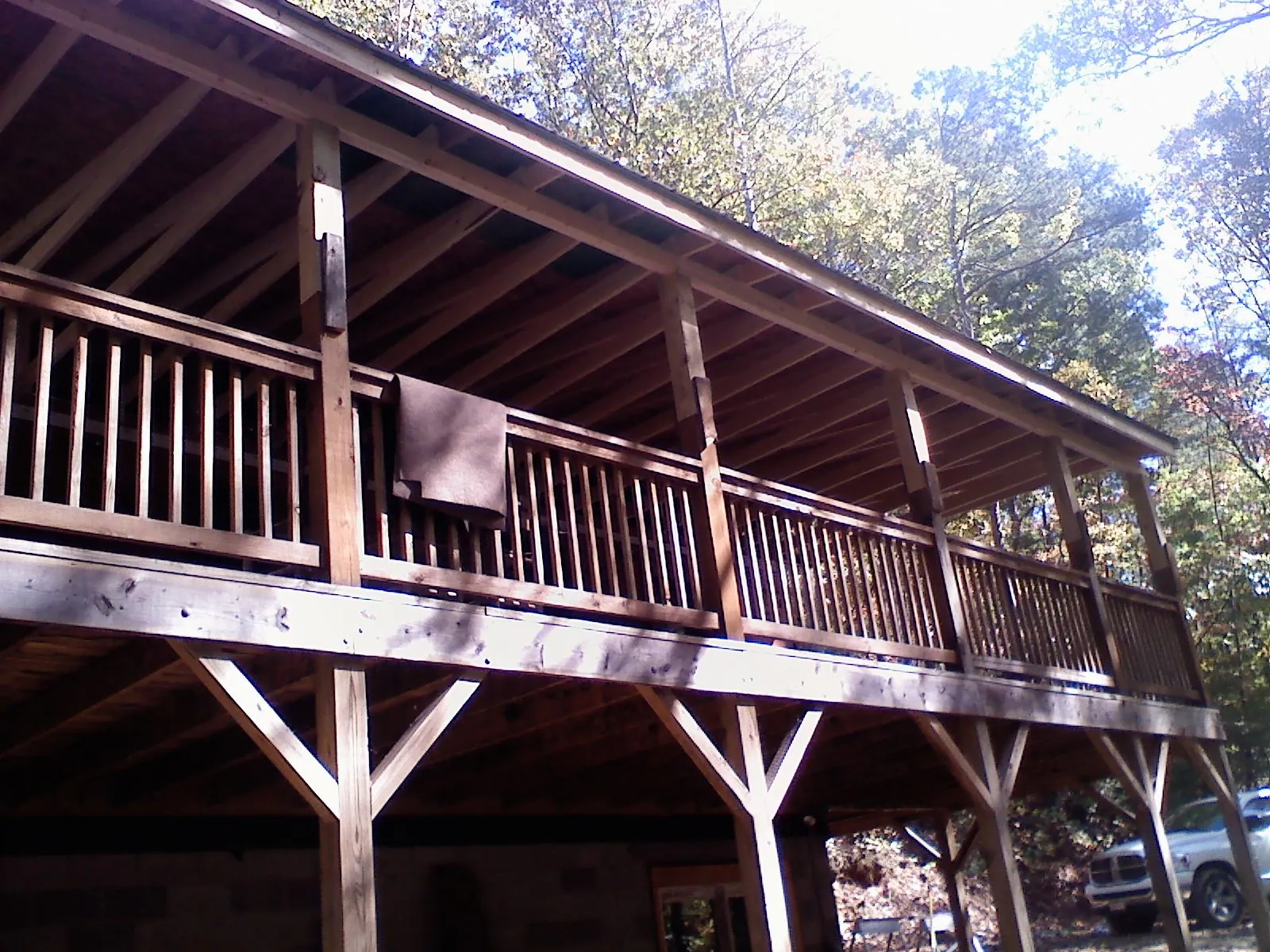Timber framing under a new elevated porch and deck — Roof Leak Repair in Martinsdale by Roofing Brothers